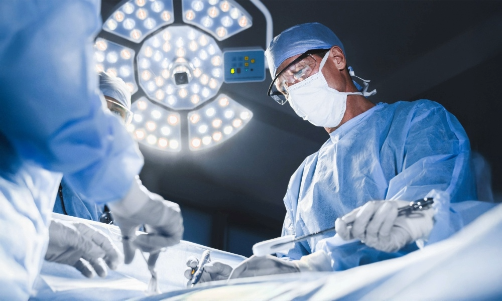 Doctor implementing biocompatible silicone elastomers