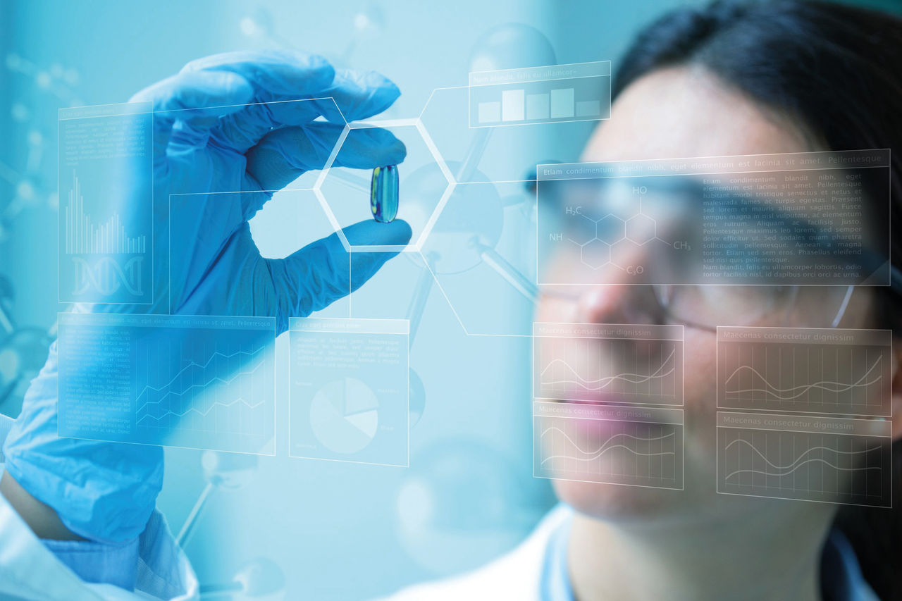 Woman examing supplement capsul Excipients and Processing Aids Can Streamline Your Finished Dosage Formulations